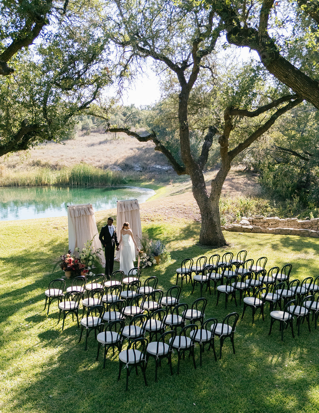 Addison Grove Austin non-hotel wedding venue ancient oak tree canopy ceremony
