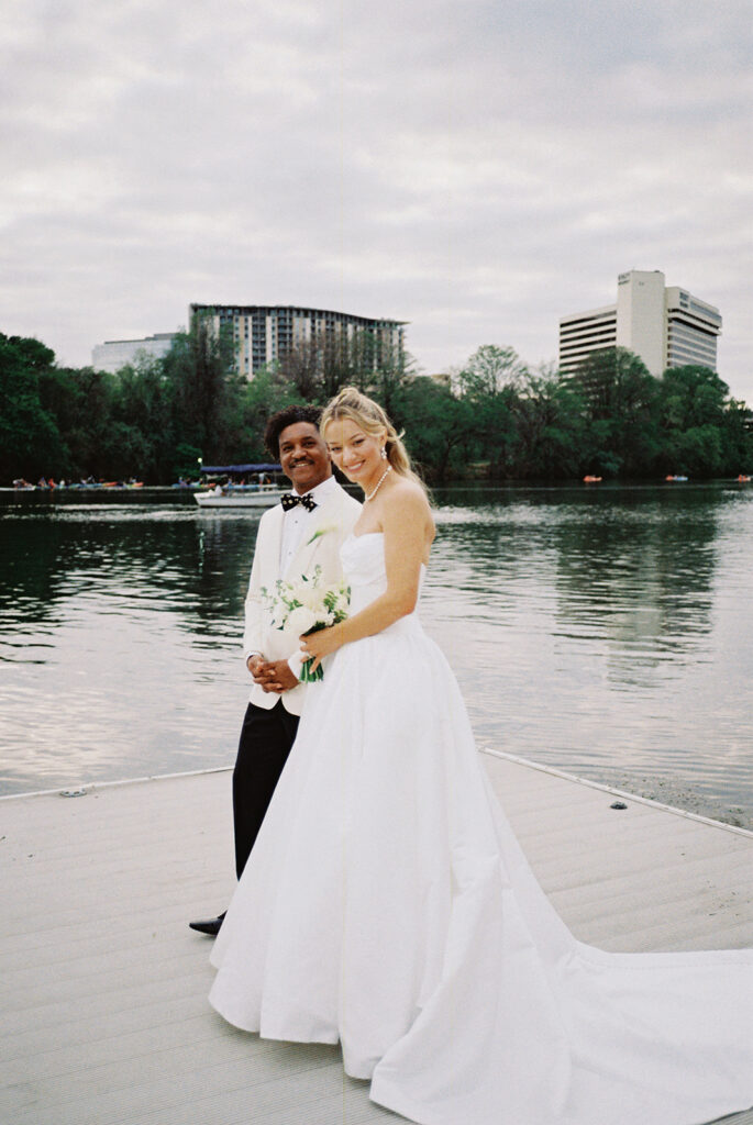 Bride and groom portraits along the lakeside trails at LINE Austin hotel wedding venue in Austin Texas