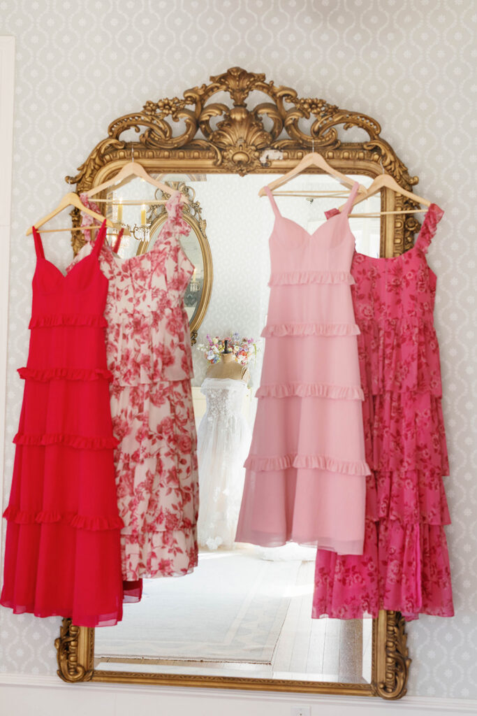Bridal party in shades of pink getting ready at Woodbine Mansion
