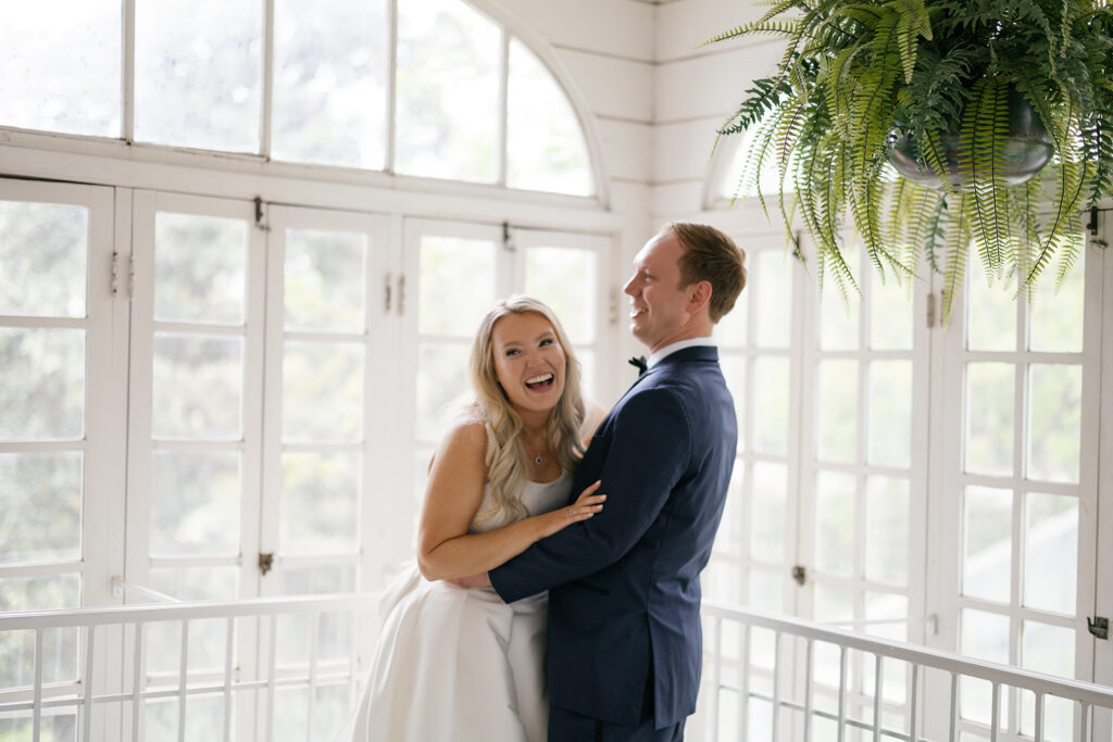 Bride and groom sharing a quiet moment during couples portraits at an Austin wedding