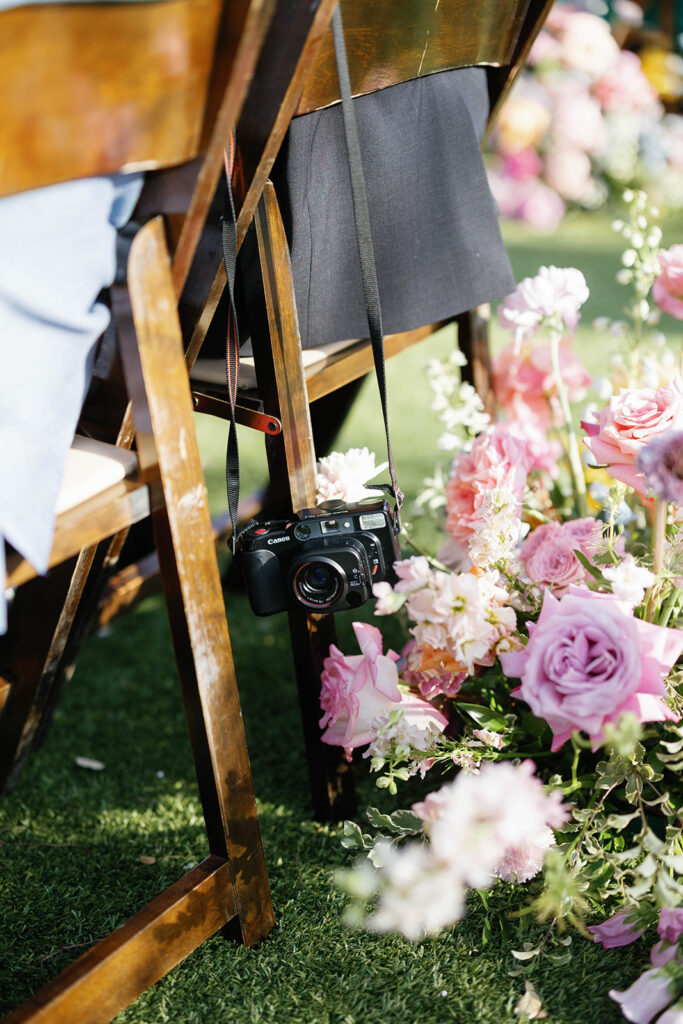Outdoor wedding ceremony under oak trees at Woodbine Mansion in Round Rock Texas
