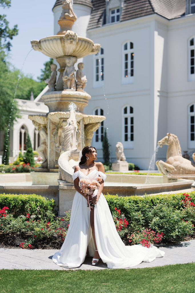 Stone facade and manicured grounds at Chateau Novelle wedding venue in Boerne, Texas