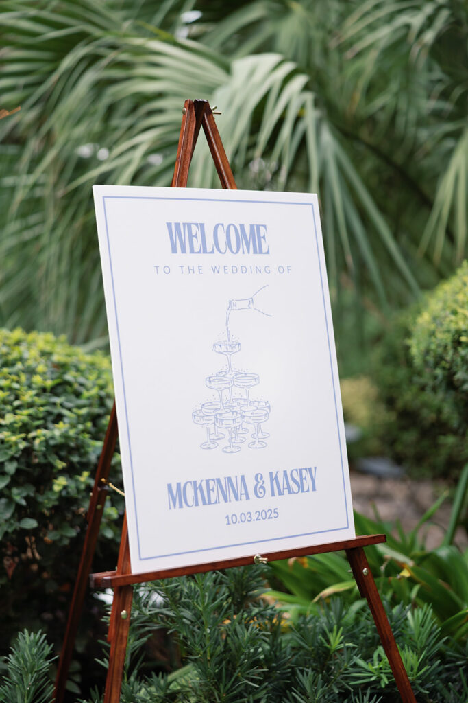 Wedding welcome sign displayed at the entrance of the Hummingbird House Wedding