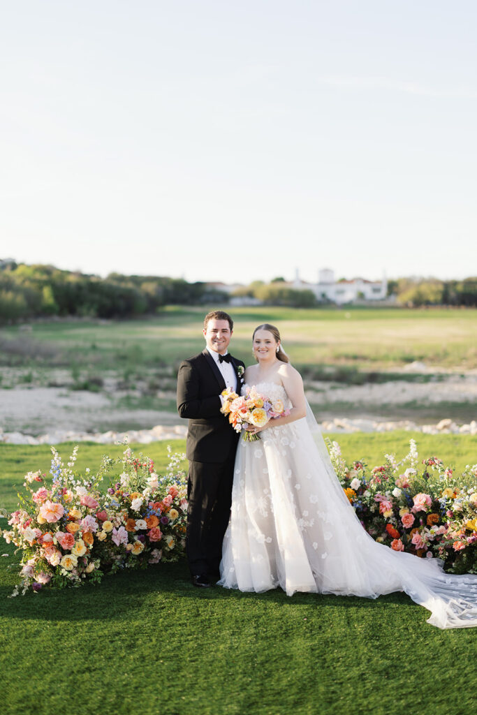 Bride and groom portrait against Texas Hill Country landscape at La Cantera Resort & Spa