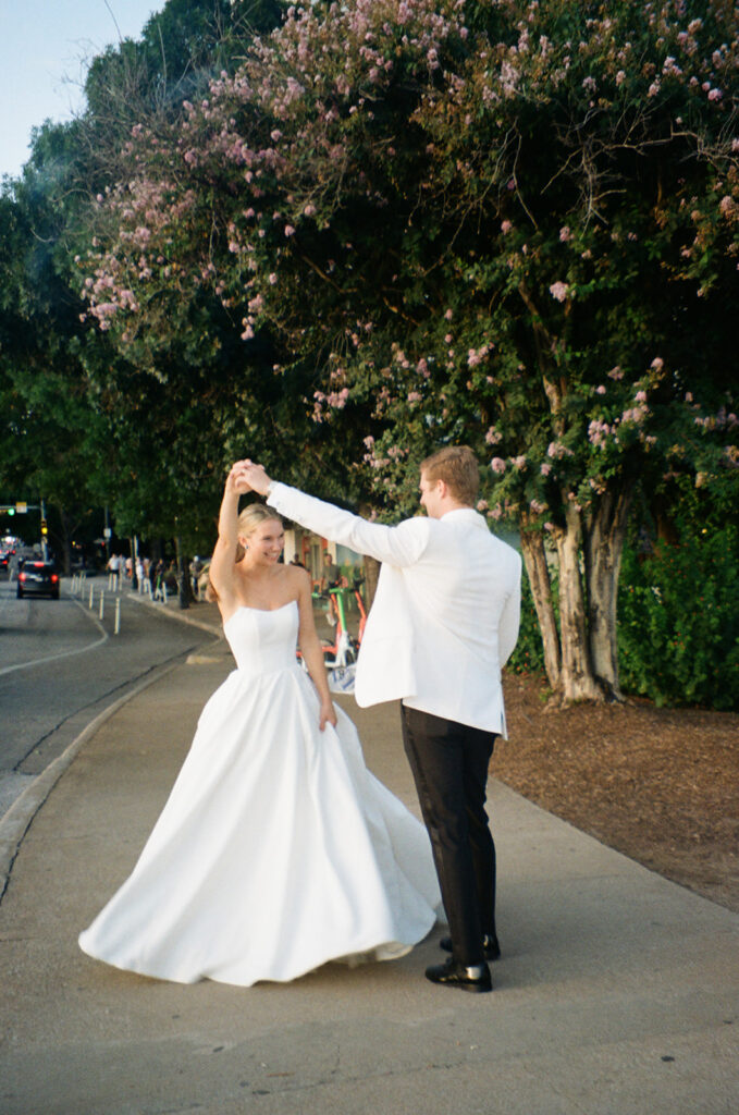 Newlyweds walking through downtown Austin after their Line Hotel wedding