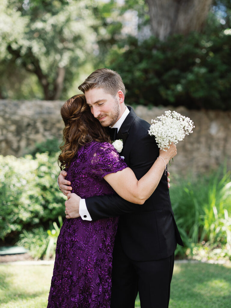 Candid family portrait moment at Southwest School of Art wedding