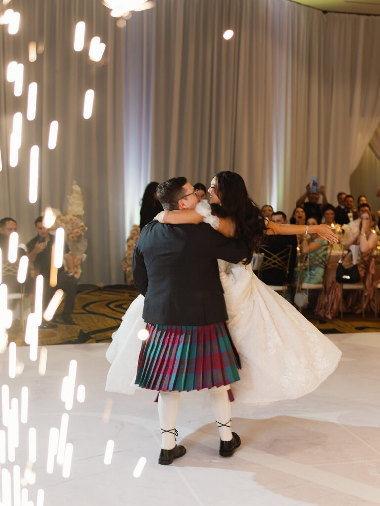 Bride and groom sharing their first dance at a Signia by Hilton wedding reception