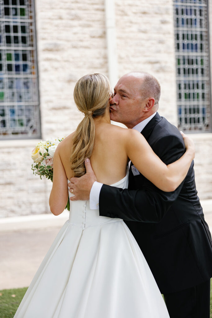 Bride and her father sharing a moment before the ceremony