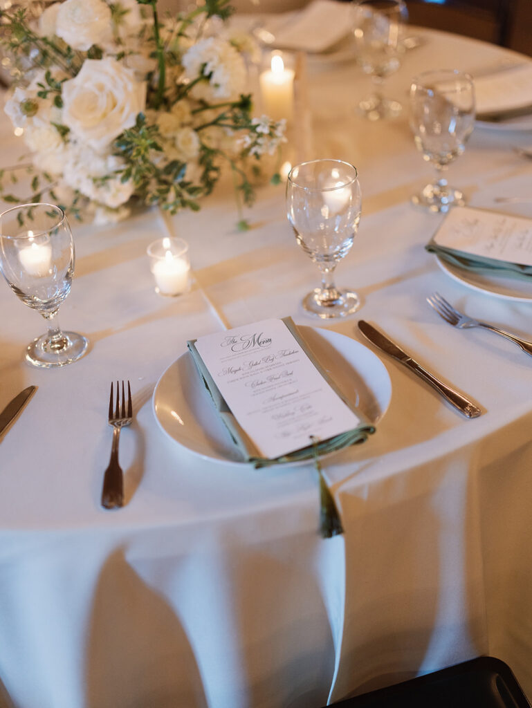 Moody candlelit tablescape at San Antonio wedding reception