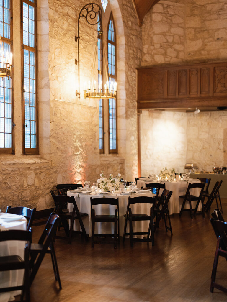 Moody candlelit tablescape at San Antonio wedding reception