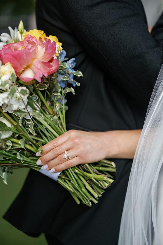 Bride's bouquet detail with vibrant wedding flowers in Austin