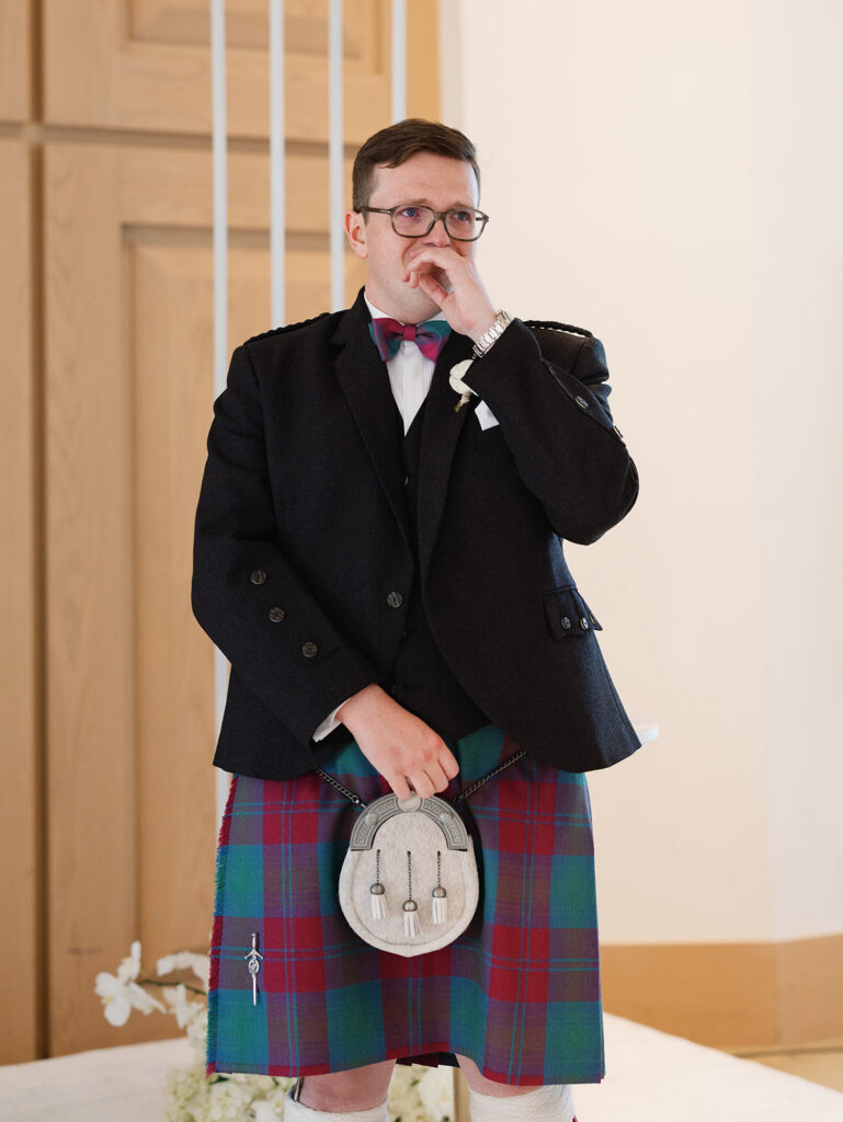 Groom's reaction seeing the bride during their Signia by Hilton wedding