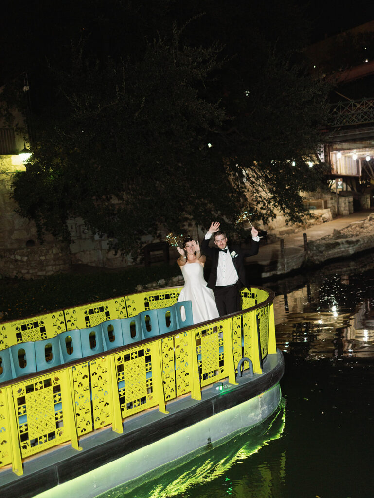 Bride and groom riverboat exit on the San Antonio River
