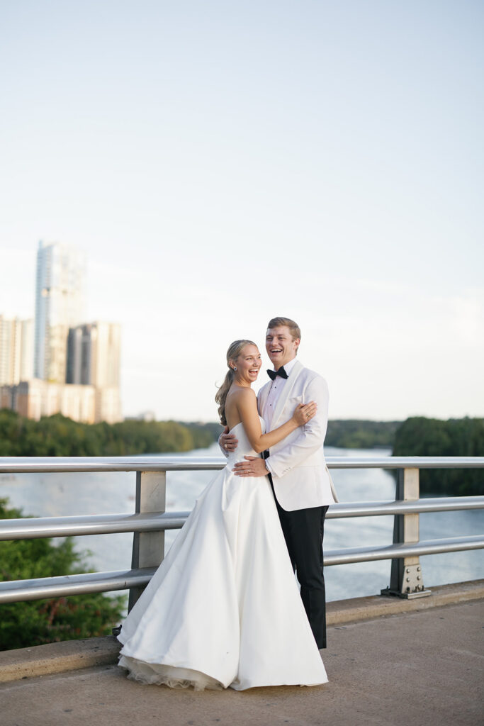 Bride and groom portrait along Lady Bird Lake near The Line Hotel